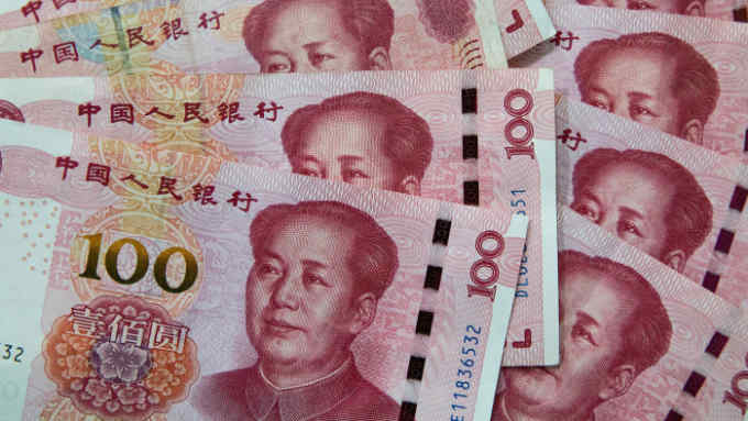 Mandatory Credit: Photo by ROMAN PILIPEY/EPA-EFE/Shutterstock (10354337g) Chinese 100 yuan or renminbi (RMB) notes in Beijing, China, 05 August 2019. China's Yuan fell below the key level of seven to the US Dollar for the first time in eleven years, following the last week's US President Donald Trump's threat for more tariff on Chinese goods, according to media reports on 05 August 2019. China's Yuan fell below the key level of seven to the US Dollar, Beijing - 05 Aug 2019