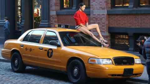 BGUK_1211644 - ** RIGHTS: ONLY UNITED KINGDOM ** New York, NY  - Model Adriana Lima is seen doing a photo shoot in New York. Adriana looked cute in a red sweater and patterned shorts while posing on a taxi cab.

Pictured: Adriana Lima

BACKGRID UK 20 APRIL 2018 

BYLINE MUST READ: DARA / BACKGRID

UK: +44 208 344 2007 / uksales@backgrid.com

USA: +1 310 798 9111 / usasales@backgrid.com

*UK Clients - Pictures Containing Children
Please Pixelate Face Prior To Publication*