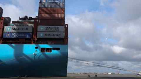 Shipping containers sit aboard the Morten Maersk Triple-E Class container ship, operated by A.P. Moeller-Maersk A/S, as it stands on the dockside at the Port of Felixstowe, a subsidiary of Hutchison Whampoa Ltd., in Felixstowe, U.K., on Thursday, April 2, 2015. The U.K. economy grew more than initially estimated in the fourth quarter as consumers and exporters steered Britain into its longest stretch of uninterrupted growth since 2008. Photographer: Chris Ratcliffe/Bloomberg