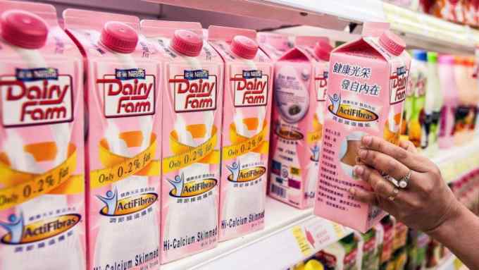 02 : Dairy Farm milk is pictured on the shelves of Park 'N ' Shop in Hong Kong , 27 July 2006 .Paul Hilton