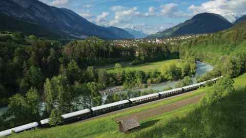 the Venice Simplon Orient Express passing through near Roppen, Austria belomond