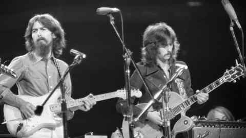 George Harrison, left, with Eric Clapton at the Concert for Bangladesh at Madison Square Garden, New York, in 1971