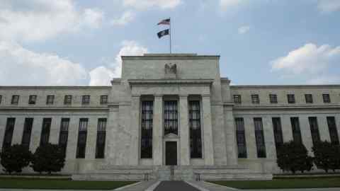 (FILES) In this file photo taken on June 14, 2017, the US Federal Reserve is seen in Washington, DC. - Business &quot;optimism has waned&quot; in the US amid uncertainty over tariff disputes, rising interest rates and continued labor shortages, the Federal Reserve said on December 5, 2018. The Fed's &quot;beige book&quot; survey of the economy showed the impact of President Donald Trump's punitive import tariffs has become more widespread, with cost increases felt by manufacturers, retailers and restaurants, restraining demand. (Photo by ANDREW CABALLERO-REYNOLDS / AFP)ANDREW CABALLERO-REYNOLDS/AFP/Getty Images