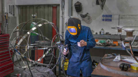 Welding sections of a stainless-steel armillary sphere sundial at David Harber’s workshop