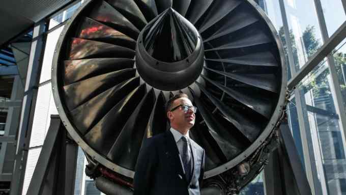 Alan Joyce, chief executive officer of Qantas Airways Ltd., stands for a photograph in Sydney, Australia, on Thursday, Feb. 23, 2016. Qantas posted a record first-half profit and announced its second capital return in less than six months as Joyce’s cost-cutting program and lower fuel prices boost Australia's largest airline. Photographer: Brendon Thorne/Bloomberg *** Local Caption *** Alan Joyce