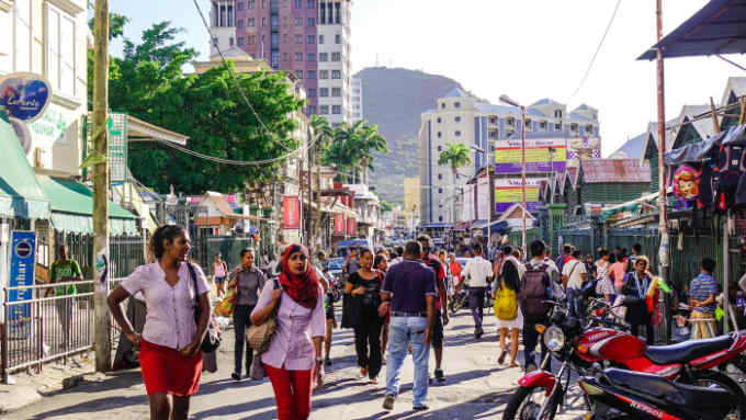 JGPA5M Port Louis, Mauritius - Jan 4, 2017. People walking on street in Port Louis, Mauritius. Port Louis is the business and administrative capital of the i