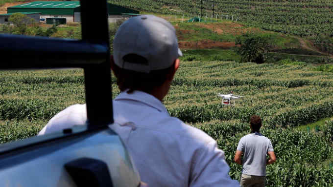 Farmers testing Aerobotics drones in South Africa - Press image