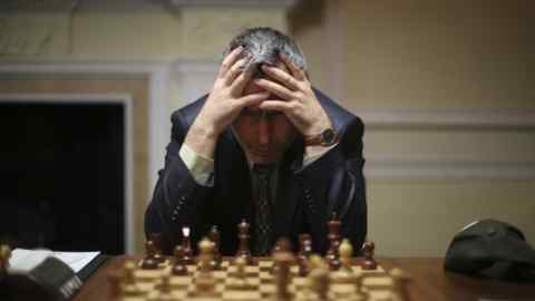 Competitors take part in the Chess World Championship in Simpsons-in-the-Strand, London.