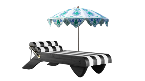 a daybed and a parasol next to each other