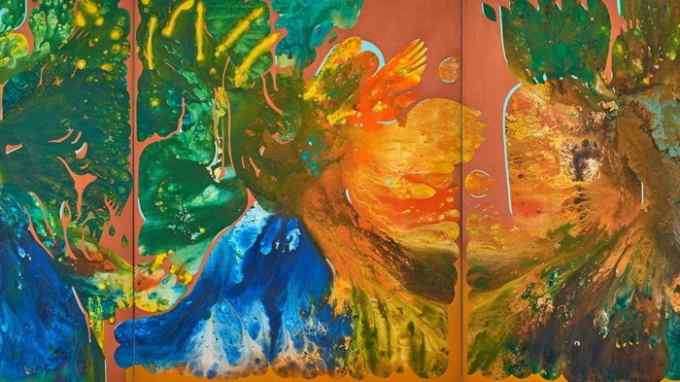 Splashy abstract painting in orange, green and blue