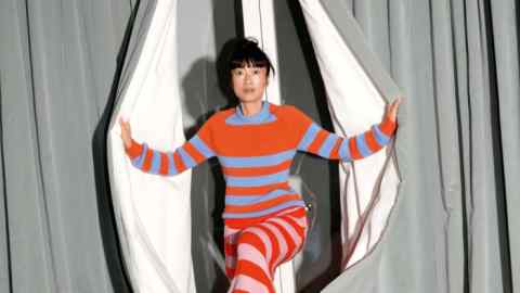 Xu wears a Marni wool striped jumper and trousers