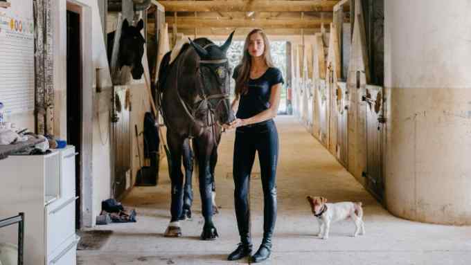 Showjumper Mathilde Pinault at the stables owned by her trainer Edouard Mathé in Auffargis, France