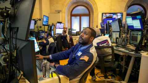 Traders work on the New York Stock Exchange floor in New York City on Friday, May 20 2022