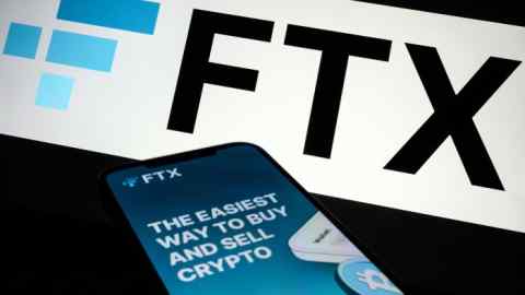 FTX logo and mobile app adverts are displayed on screens