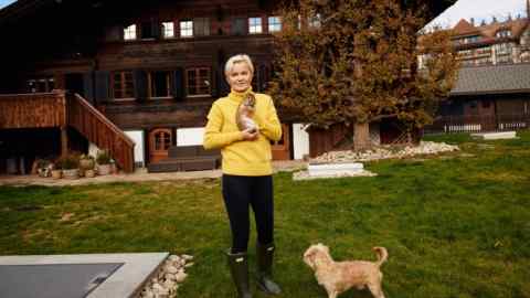 Dr Barbara Sturm photographed at her house in Gstaad with Ricky, her daughter’s rabbit, and Whiskey, her dog