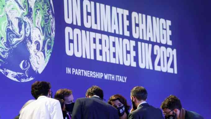 Delegates talk during the UN Climate Change Conference