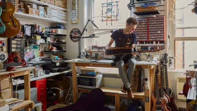 Kevin Bourque in his guitar and musical instrument repair shop, Stairway To Kevin, London