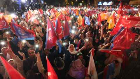 Supporters of Turkish president Recep Tayyip Erdoğan gather outside the AKP’s headquarters in Ankara on Monday