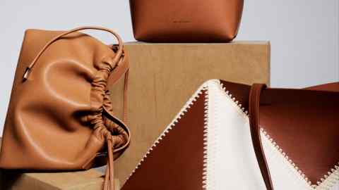 Clockwise from top: Mansur Gavriel vegan Apple bag (made from repurposed apple waste), $495. Nanushka alt-napa crochet The Origami tote bag, £995. APC recycled leather-look drawstring bag, £255