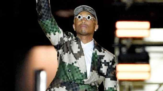 Louis Vuitton’ fashion designer and singer Pharrell Williams acknowledges the audience at the end of the Louis Vuitton Menswear Spring-Summer 2024 show