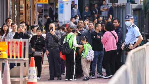 Tourists visit the Sha Tau Kok border area between Hong Kong and mainland China on New Year’s Day after the once restricted zone opened up