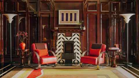 The fireplace in the lobby at 60 Curzon with artwork by David Tremlett