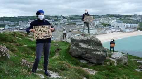 Activists in Cornwall. Environmental emergencies have pushed people to invest according to their values