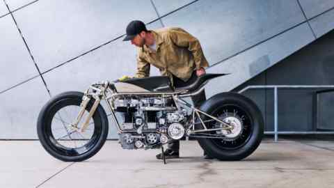 Max Hazan polishes the Blown Velocette motorbike, sold for $125,000