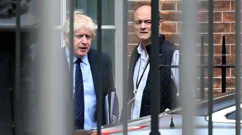 Dominic Cummings (R), who is leaving his role as special adviser,  with Boris Johnson at Downing Street last year