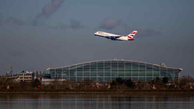 A BA plane takes off at Heathrow Airport