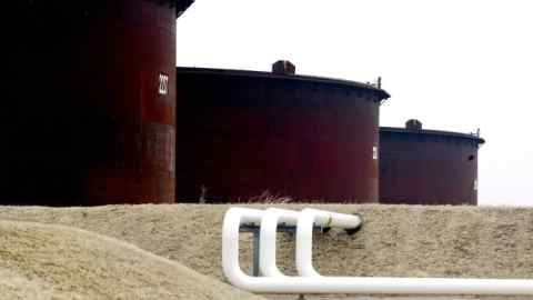 Oil pipelines feed into storage tanks at the Enbridge Cushing Terminal in Cushing, Oklahoma