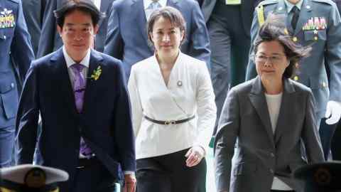 Taiwan’s President Lai Ching-te, left, vice-president Hsiao Bi-khim, centre, and former president Tsai Ing-wen walking during the inauguration ceremony at the Presidential Office Building in Taipei on May 20