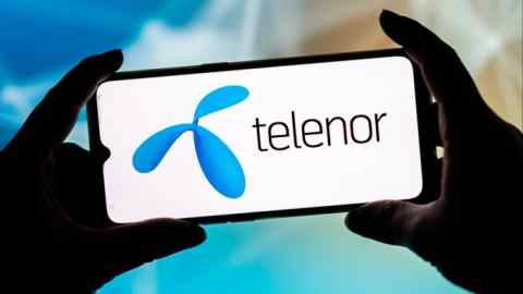 Telenor logo displayed on a smartphone