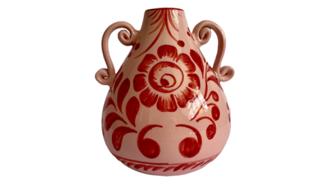 A round vase with a tear-drop shape and two handles