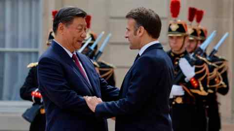 Xi Jinping, left, with Emmanuel Macron