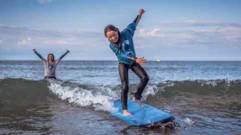A Wave Project surfing class in Cayton Bay, North Yorkshire