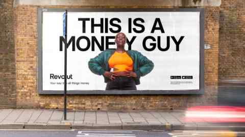 A Revolut advertisement on a billboard