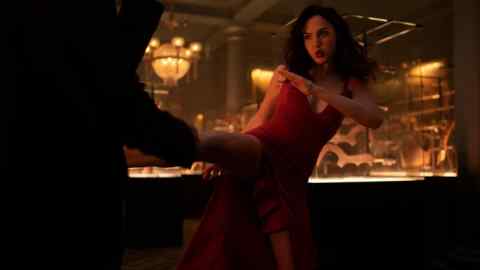 Still image from film ‘Red Notice’ showing actor Gal Gadot kicking opponent