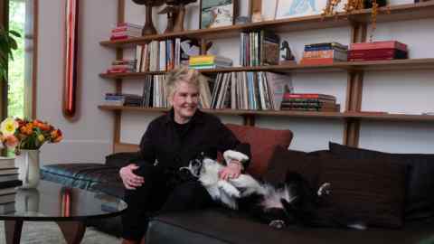 Liz Lambert at home in Austin, Texas, with her dog Poppa