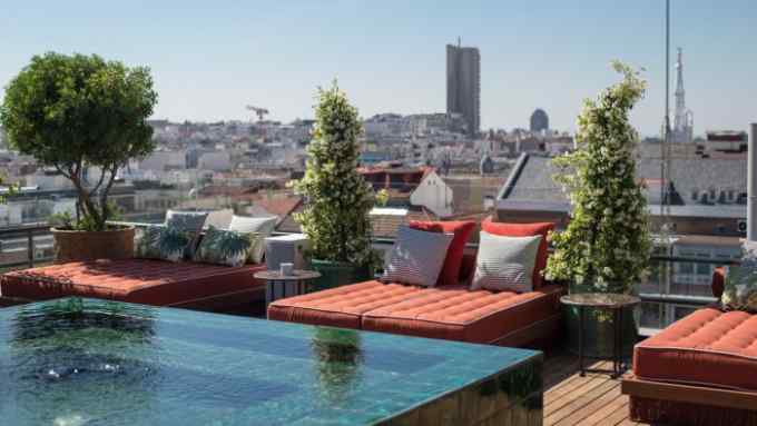The rooftop pool at Madrid’s Bless Hotel, looking over the skyline