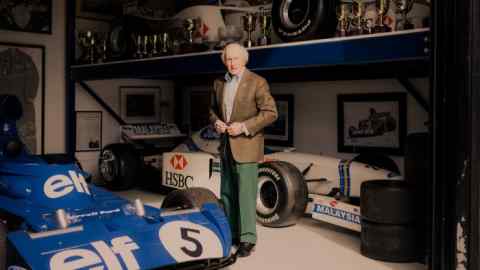 Sir Jackie Stewart at home in Buckinghamshire – in front of him is his 1973 Formula 1 World Championship- winning Tyrrell
