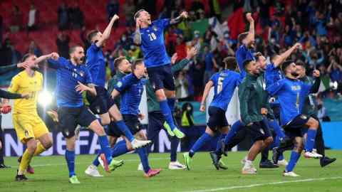 Italy’s players celebrate reaching the Euro 2020 final