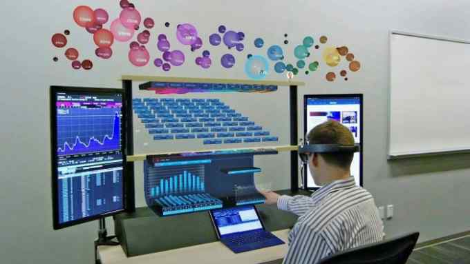 Citigroup’s augmented reality workstation, combining 3D holograms and real-time financial data. The bank developed the system four years ago but never implemented it