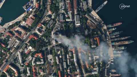 A satellite image shows smoke billowing from the HQ of Russia’s Black Sea fleet in Sevastopol after a missile strike in September