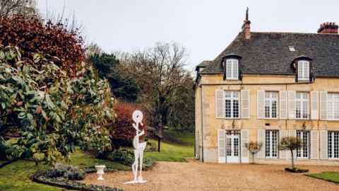 Untitled, 2006, by Aaron Curry stands outside the château