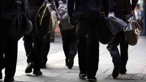 Uniformed children walking to school