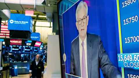 Federal Reserve chair Jay Powell speaking on a television screen on the floor of the New York Stock Exchange on Wednesday