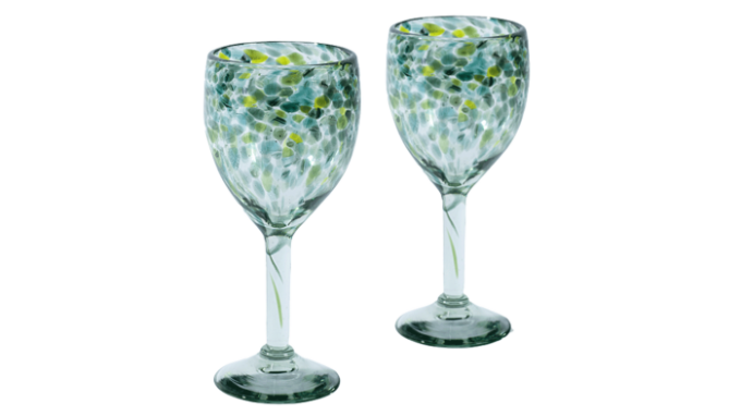 a pair of wine glasses with a green confetti pattern