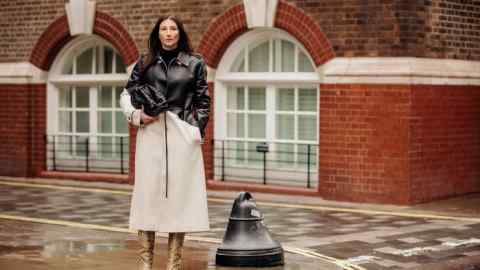 Maria Milano, head of womenswear at Harrods, wears a trench coat by Bottega Veneta