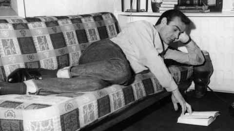 Sean Connery relaxing with a book